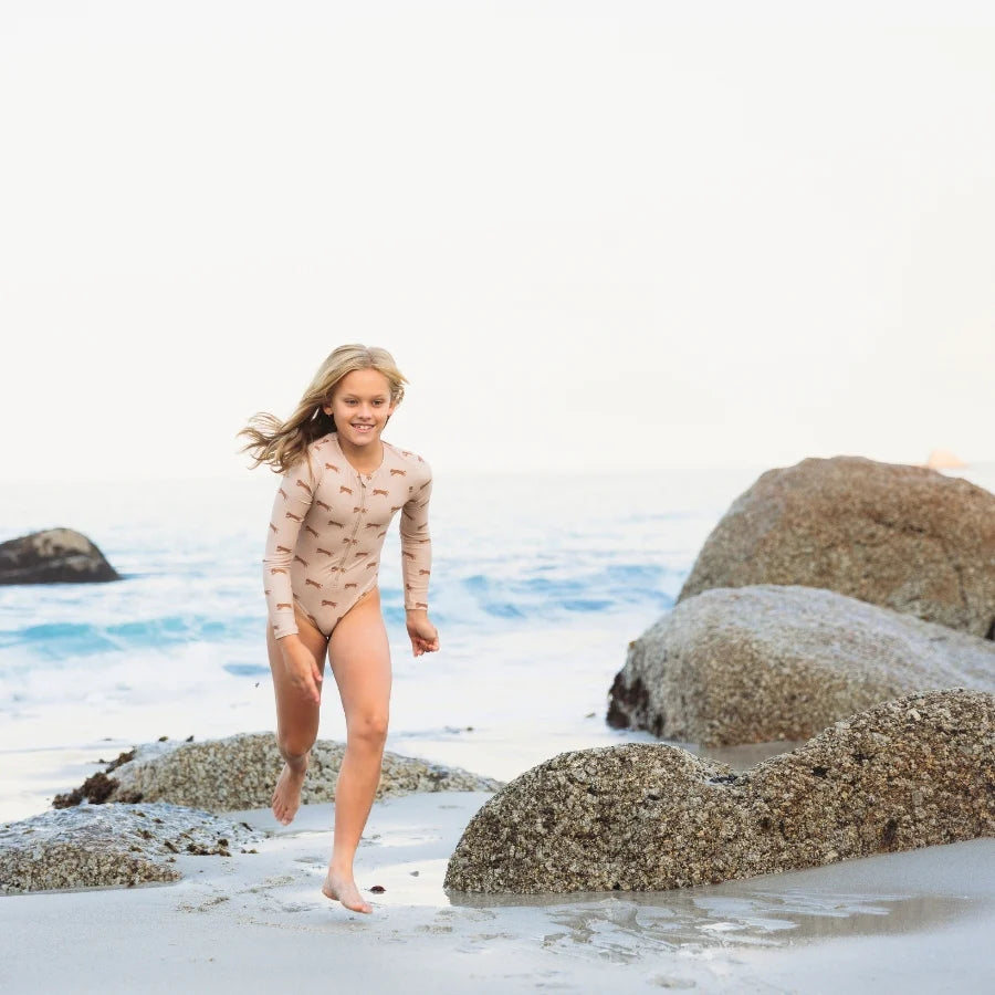 Roamer | UV beige swimsuit with long sleeves for girls