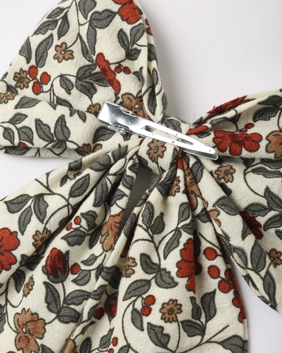 OVERSIZED BOW HOLIDAY FLORAL